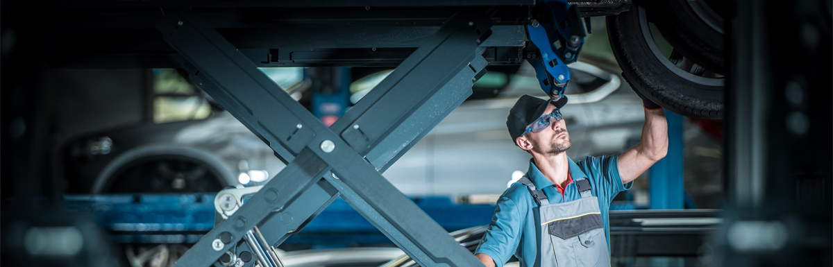 Mechanic doing repair work on a vehicle - Car Repairs Brighton